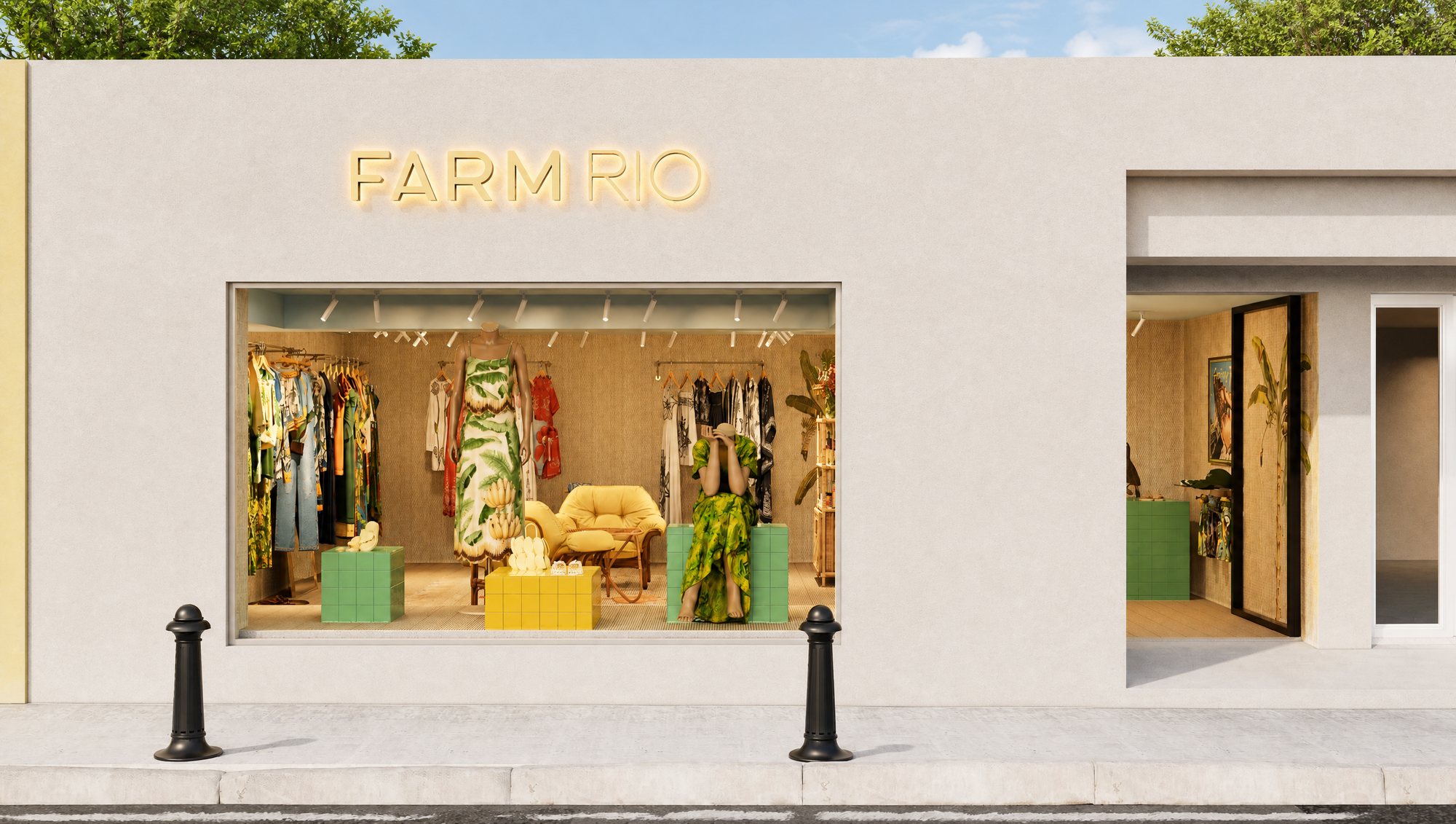 Fachada de pop-up Farm Rio com vitrine iluminada e roupas coloridas